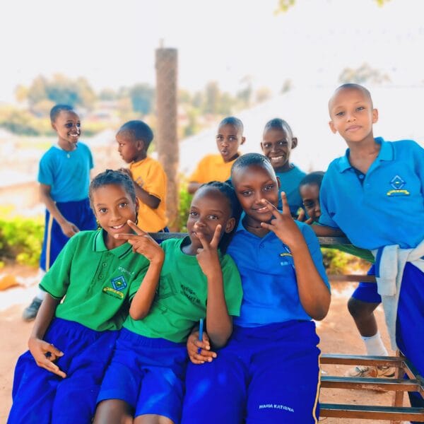 kasumba-nursery-and-primary-school-learners-seated-on-school-compound-mubende-uganda