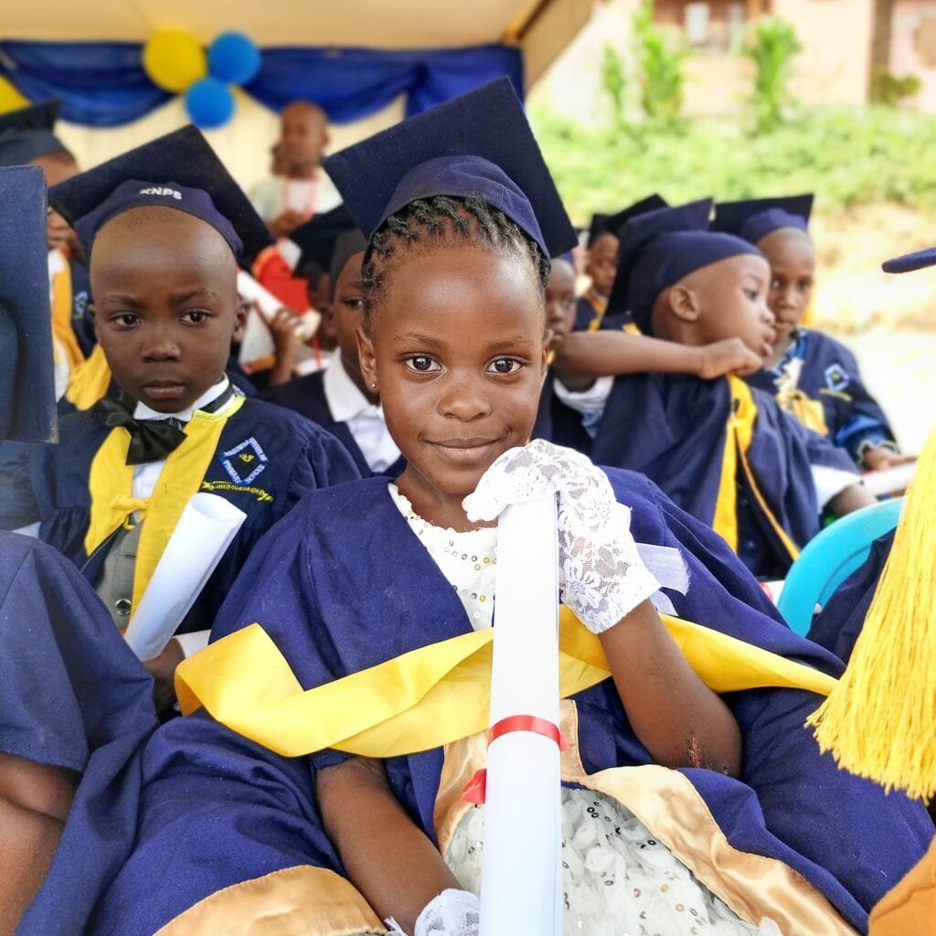 Kasumba learners celebrating an achievement at Kasumba Nursery and Primary School in Mubende, Uganda