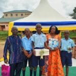 Kasumba Nursery and Primary School parent speaking during a testimonial session