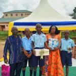 Kasumba Nursery and Primary School parent speaking during a testimonial session