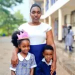 Kasumba Nursery and Primary School parent sharing a testimony